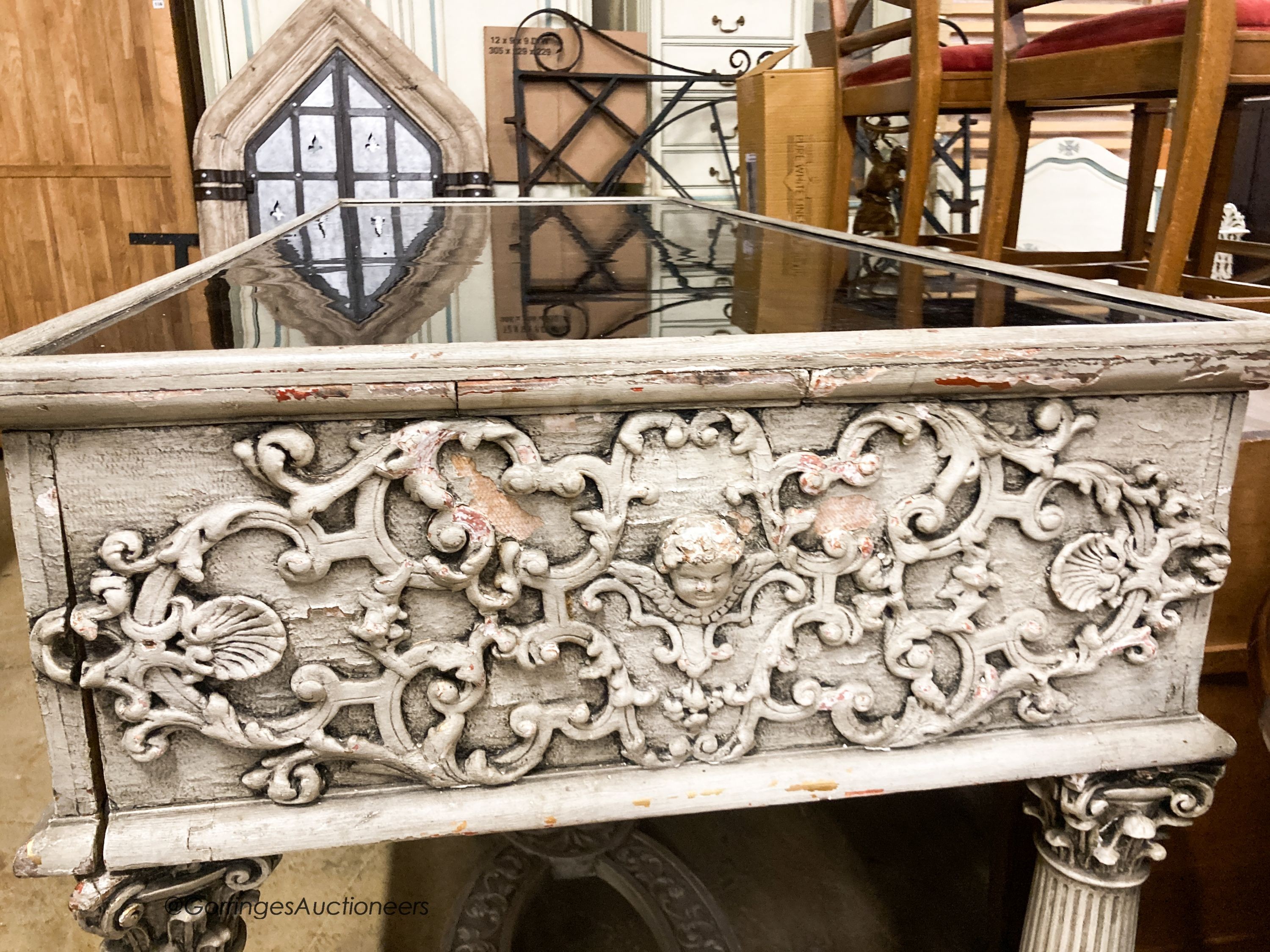 An 18th century style painted two drawer glass top console table, width 180cm, depth 73cm, height 95cm